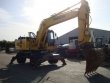 Колесный экскаватор Колесный экскаватор KOMATSU PW 1